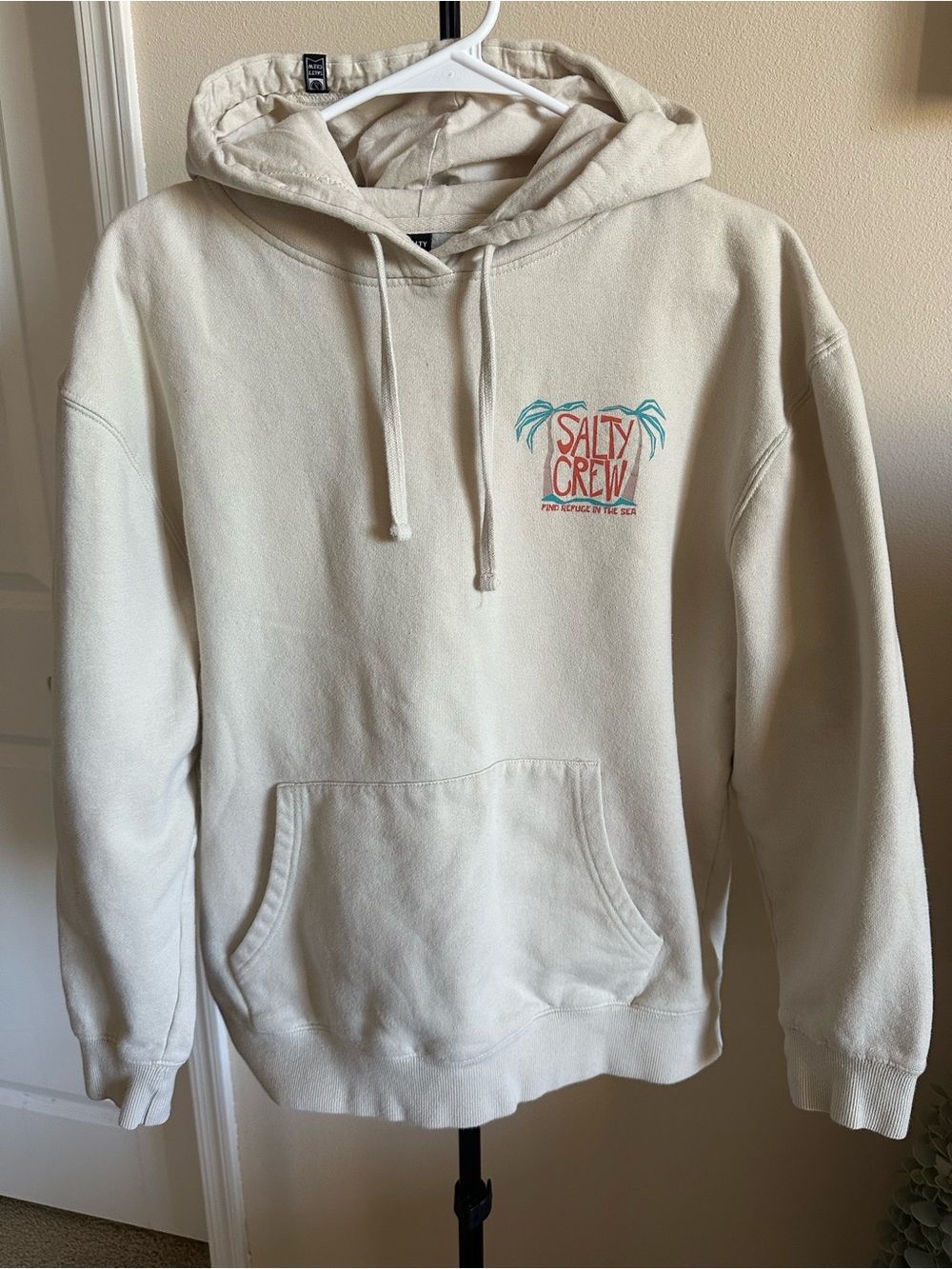 Salty Crew Cream Pullover Hoodie with Coral & Teal Logo